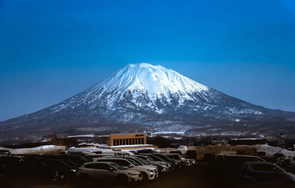 Snow-capped Mount Yotei above Niseko under a clear blue sky