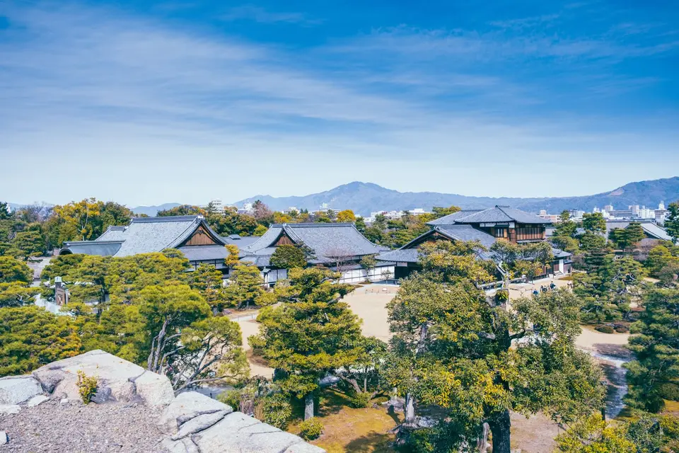 Nijo Castle's palace roofs among its gardens