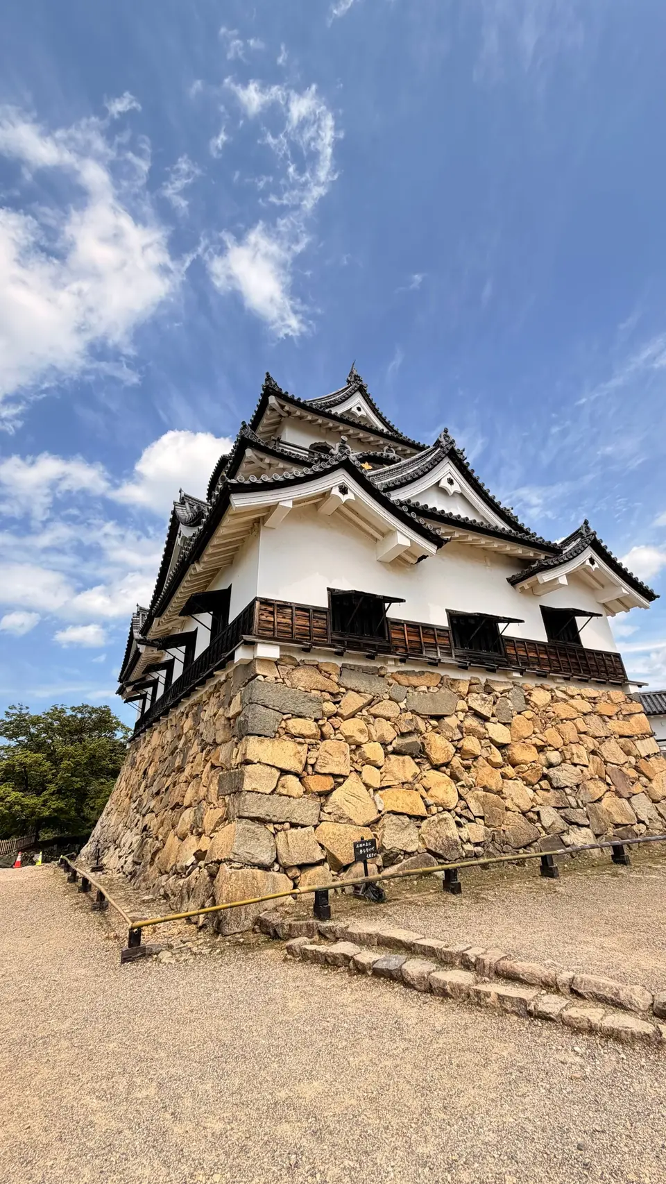 The keep of Hikone Castle on its stone walls
