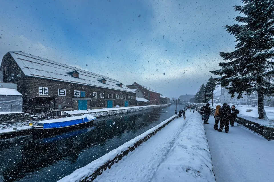Otaru Canal and its stone warehouses in falling snow